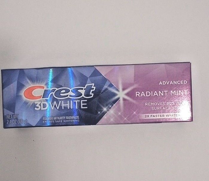 Crest 3D White Fluoride Anticavity Whitening Toothpaste, Radiant Mint, 2.4 OZ