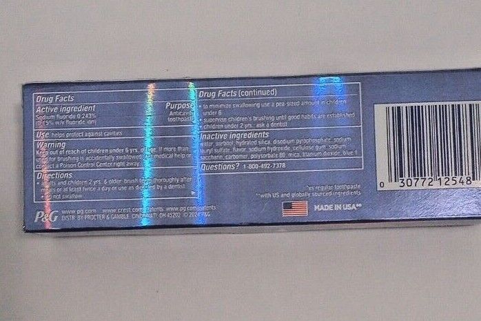 Crest 3D White Fluoride Anticavity Whitening Toothpaste, Radiant Mint, 2.4 OZ