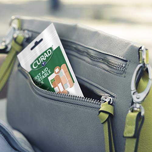 Curad First Aid Portable Pack  Ideal for Travel  Water Resistant Pouch  15 Count